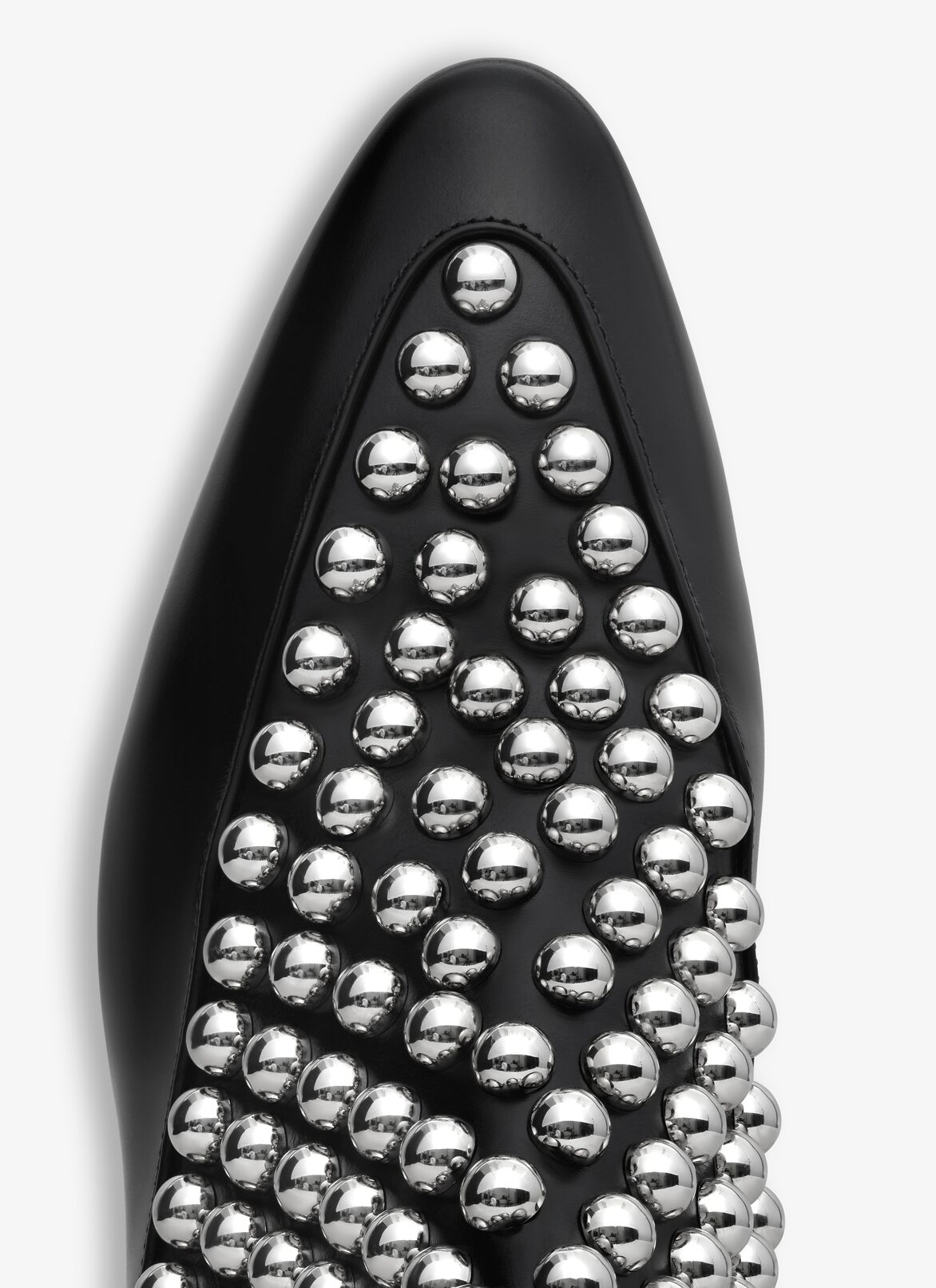 ASYMETRIC ANKLE BOOTS IN GLOSSY CALFSKIN WITH STUDS ALAÏA BLACK ASYMETRIC ANKLE BOOTS IN GLOSSY CALFSKIN WITH STUDS